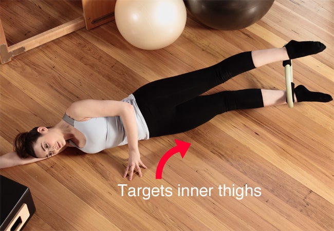 Adductor squeeze - targets inner thigh - IMAGE - Women's Health & Fitness