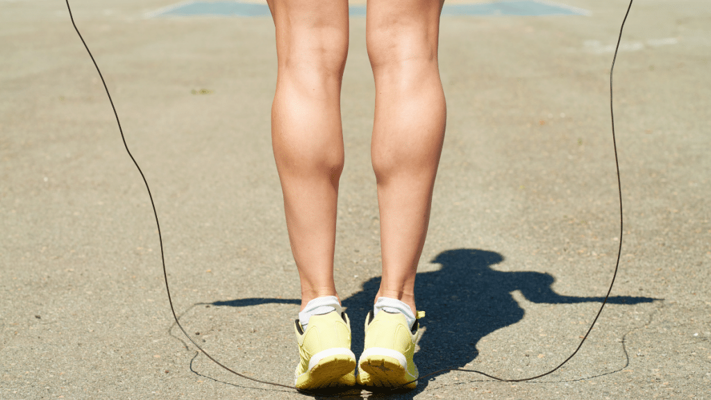 close up of woman jump roping showing her calves 